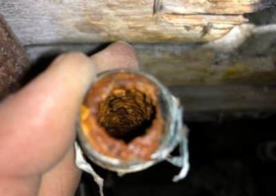 hard water damage inside plumbing pipe-in Riverside CA
