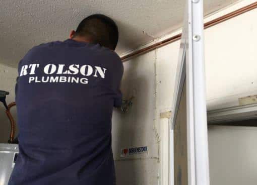 RT Olson plumber repiping copper line to water heater geo