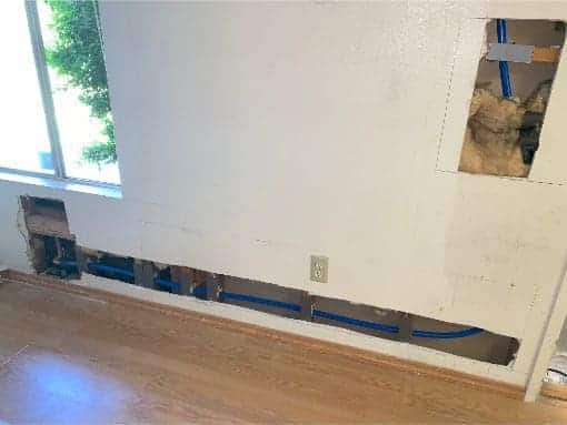 drywall cutaways to repipe whole house with PEX pipe
