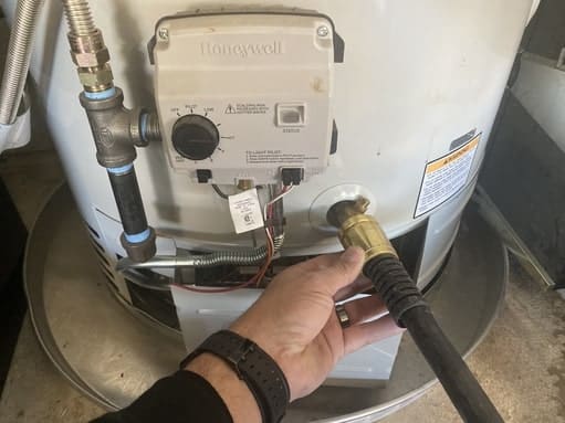 attached hose to water heater for draining