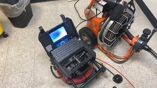 camera inspection of clogged sewer drain